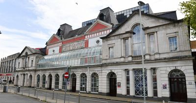 Theatre audience sat in hats, gloves and scarfs during 'freezing' performance after heating broke