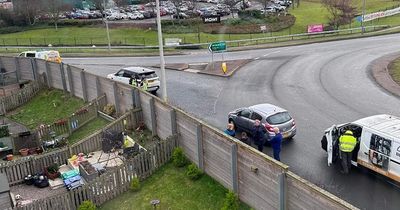 Cyclist rushed to hospital after crash with car at Scots roundabout