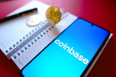 Coinbase stock up more than 10% since Friday, despite debt rating downgrade