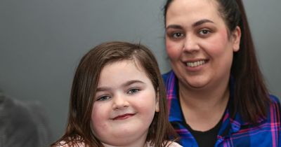 Hero seven-year-old called 999 when her mum collapsed - and even gave her baby sister a bottle until help arrived