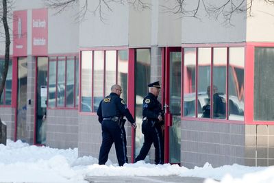 Two students dead and teacher injured in Des Moines shooting, suspect in custody