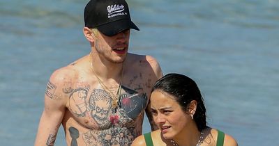 Pete Davidson goes swimming with new girlfriend after removing Kim Kardashian tattoos