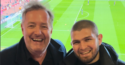 Conor McGregor rival Khabib Nurmagomedov pictured with Piers Morgan at Arsenal v Manchester United