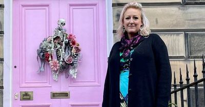 Scots homeowner could face £20k fine after losing battle over her door pink