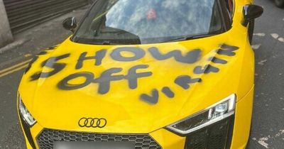 Young millionaire's £100,000 Audi vandalised with VERY rude graffiti - but he's not fussed