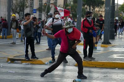 Peru protesters tear-gassed after president calls for truce