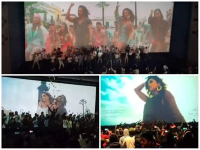 Fans celebrate 'Pathaan' release; dance to Shah Rukh Khan and Deepika Padukone's 'Jhoome Jo Pathaan' in front of screen - WATCH