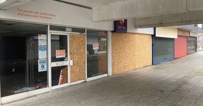 Inside the 'cesspit' shopping centre with shuttered pub and shops set for demolition