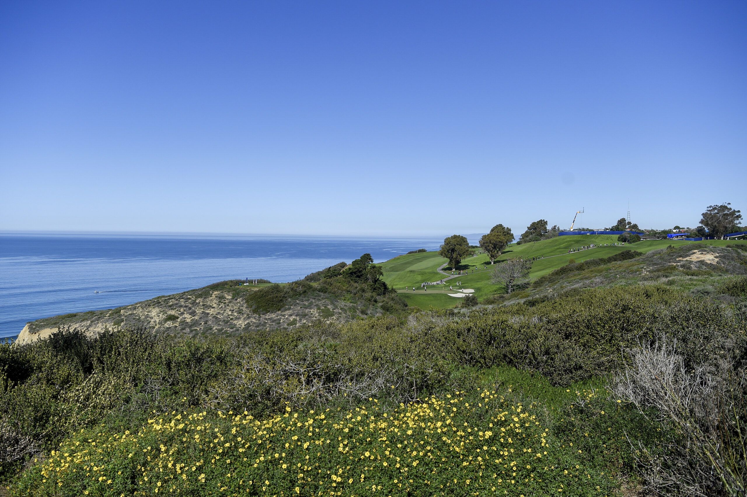 Check the yardage book Torrey Pines South Course for…