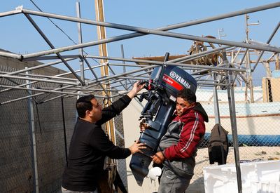 Gaza fisherman gets new outboard engine after a decade's wait, as Israel relaxes curbs