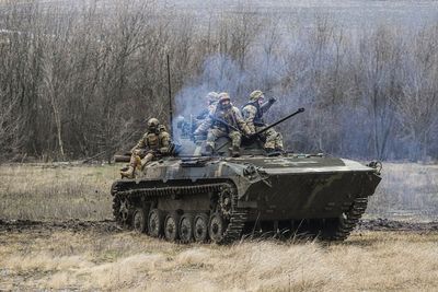 Ukraine forces pull back from Donbas town after onslaught