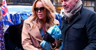 Amanda Holden flashes her legs as she arrives at Britain's Got Talent in Union Jack cab