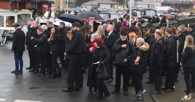 Elle Edwards mourners hug each other tightly as coffin sets off on final journey