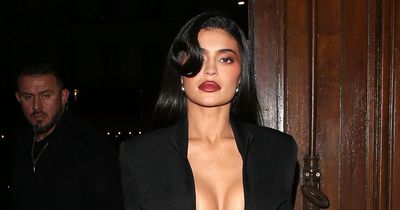 Kylie Jenner shares very racy bedroom shoot as she covers up with buckles