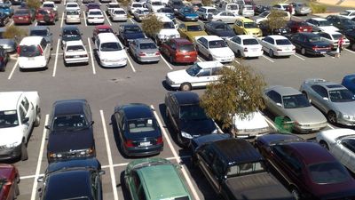 Queensland Transport Minister Mark Bailey vows to review 'rip off' parking invoices