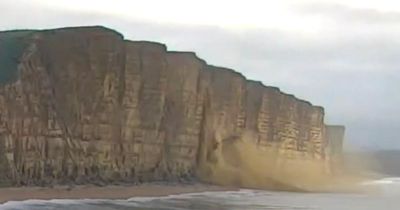 Moment huge chunk of rock weighing 1,000 tonnes collapses off Dorset coastal cliff