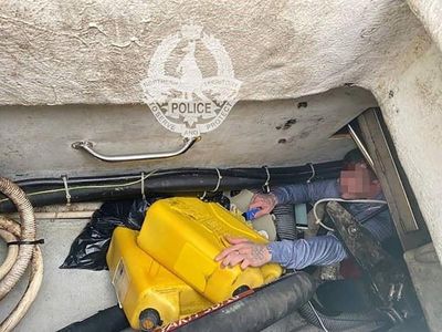 Wanted man found hiding in yacht hull