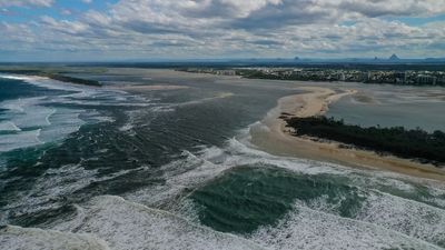 Breaking of Bribie Island sparks asbestos and erosion fears, threatens to landlock Coast Guard