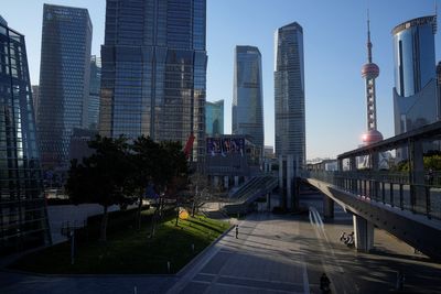 China's open borders and push to stoke economy may revive dealmaking, advisers say