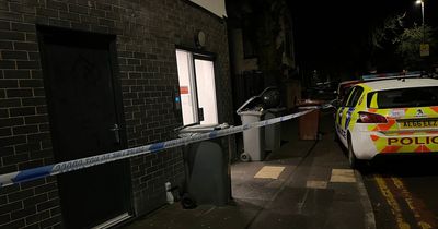 Police tape off Manchester street after brawl breaks out with one taken to hospital