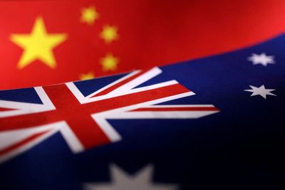 China's Xi says ties with Australia moving in "right direction" - state media