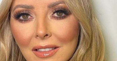 Carol Vorderman teases fans with 'secret filming' as she flaunts glam look