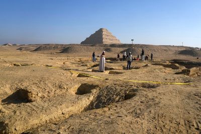 Egypt unveils tombs and sarcophagus in new excavation