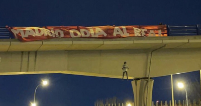 Vinicius Junior effigy slammed by Atletico Madrid as Real star targeted by 'despicable' bridge display ahead of derby