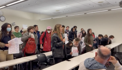 Chanting Harvard students walk out of lecture by professor accused of groping and harassment