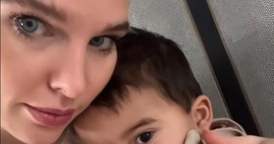 Helen Flanagan cuddles son in sweet video after being 'unable' to carry him after boob job