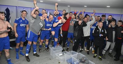 Young Darvel supporter parties with Scottish Cup heroes in wild dressing room celebrations