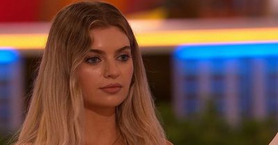 Love Island's new bombshell Ellie causes a stir as she's pulled aside for a chat