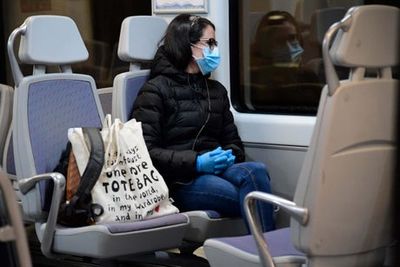 Spain to end mandatory use of face masks on public transport three years after pandemic began