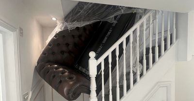 Delivery men 'left new sofa jammed on the stairs' says furious homeowner
