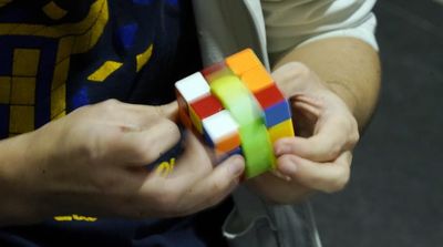 World Champion Says Rubik’s Cube and Violin Go Hand in Hand