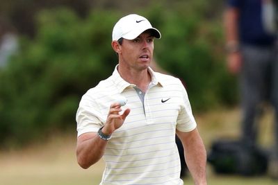 Rory McIlroy finishes superbly to take share of lead with rival Patrick Reed