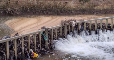 There's a 'scandal' of 'scum' in the River Medlock next to ring road - and no-one knows why