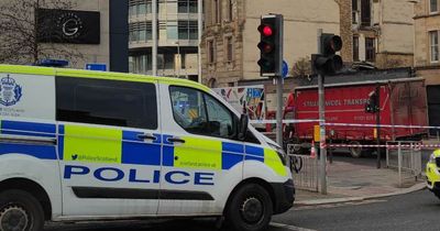 Cyclist and lorry crash on Scots city road as emergency services shut down scene