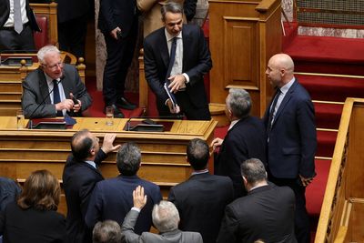 Greek government wins no-confidence vote over wiretapping scandal