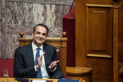 Greek government survives no-confidence vote over wiretaps