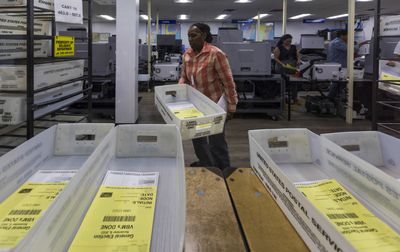 Local election officials in Florida call for scrapping new ID rules for mail voting