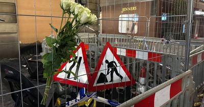 Flowers laid outside Jenners for tragic firefighter as MSP calls for posthumous George Cross