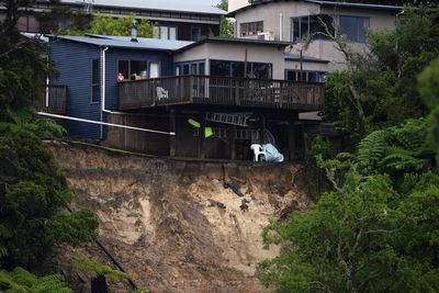 Three dead after torrential rain, flash floods inundate Auckland