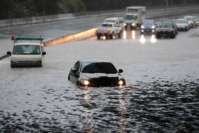 Auckland ‘clobbered’ with record-breaking downpour and massive floods