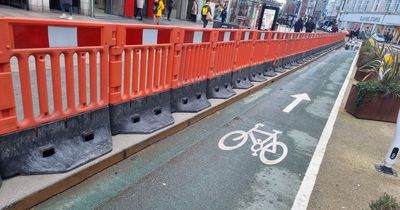 Barrier placed at Belfast city centre cycle lane after woman injured in fall