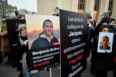 'Unbearable distress': families rally for French held in Iran
