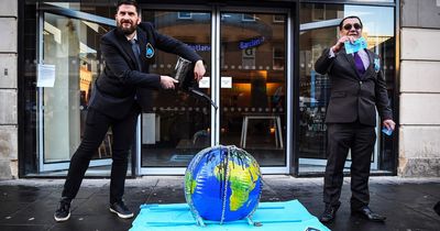 Extinction Rebellion activists stage protest outside Barclays in Glasgow