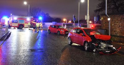 Police and fire service rush to busy road after two car crash