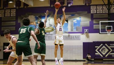 Downers Grove North’s combination of shooting and size too much for Lane