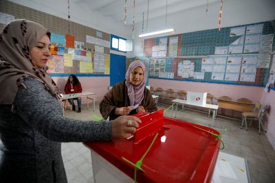 Tunisians elect weakened parliament on 11% turnout